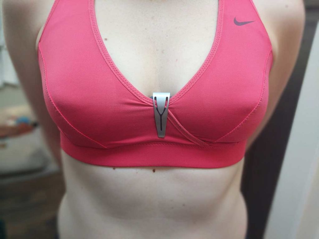 The Spire review shows the wearable device clipped to my bra.